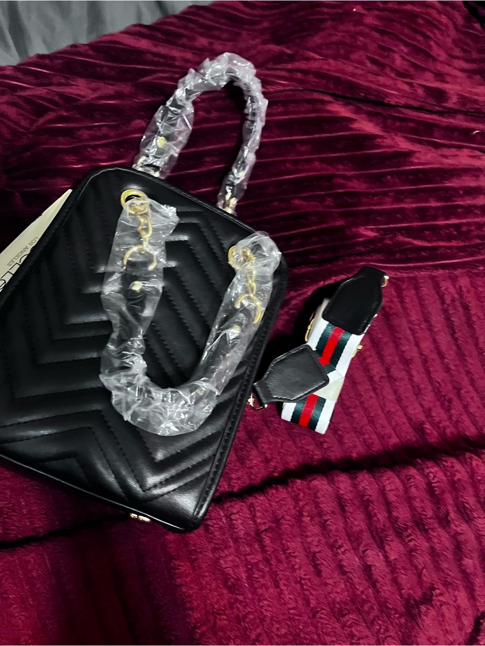 Stylish Black Quilted Shoulder Bag with Detachable Striped Strap
